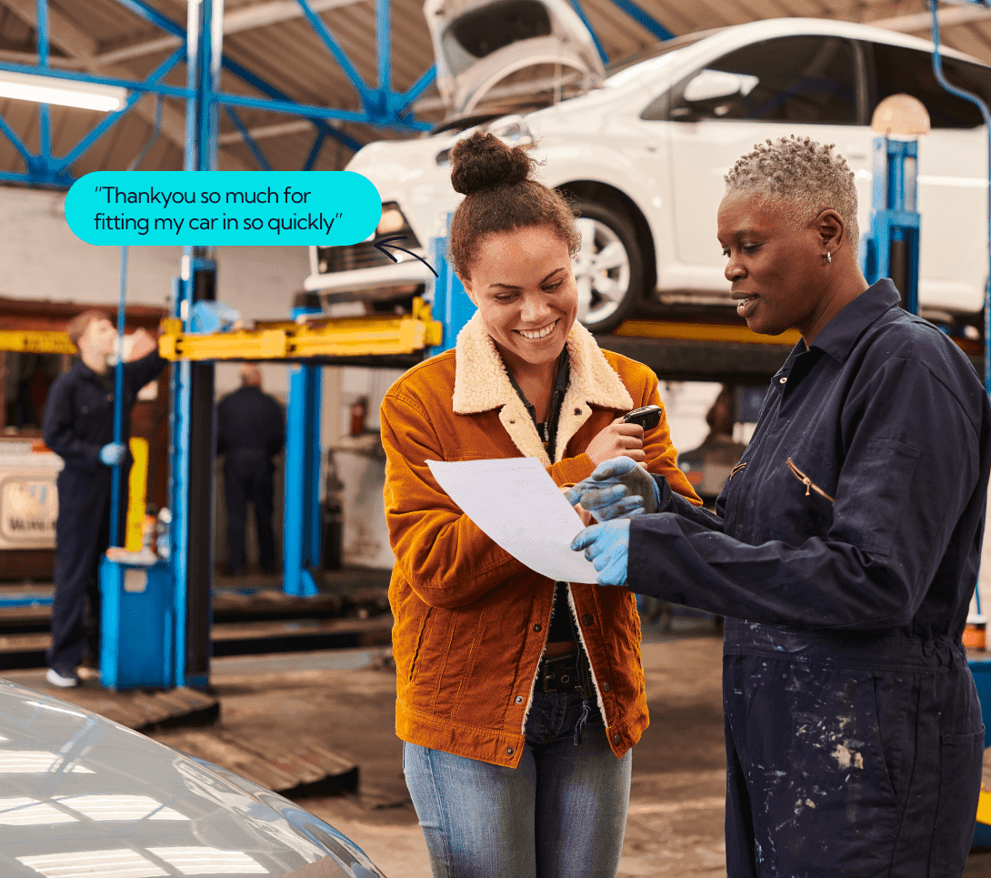 Garage technician carrying out a vehicle service